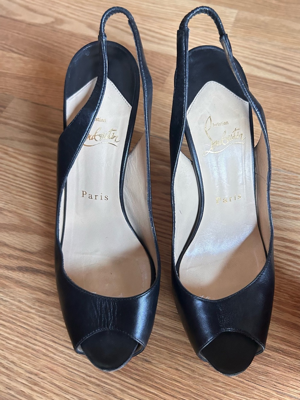 Christian Louboutin Black Leather Slingback Peep-Toe Heels. Best on 7 - 7.5 foot